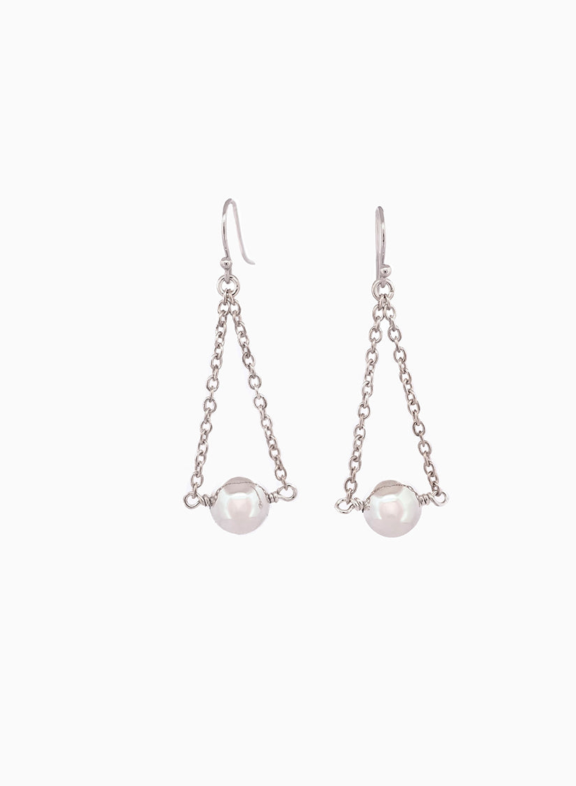 Pair of bold Silver drop earrings with Sterling silver spheres, hook and chain. Medieval inspired jewellery handcrafted in Sydney.