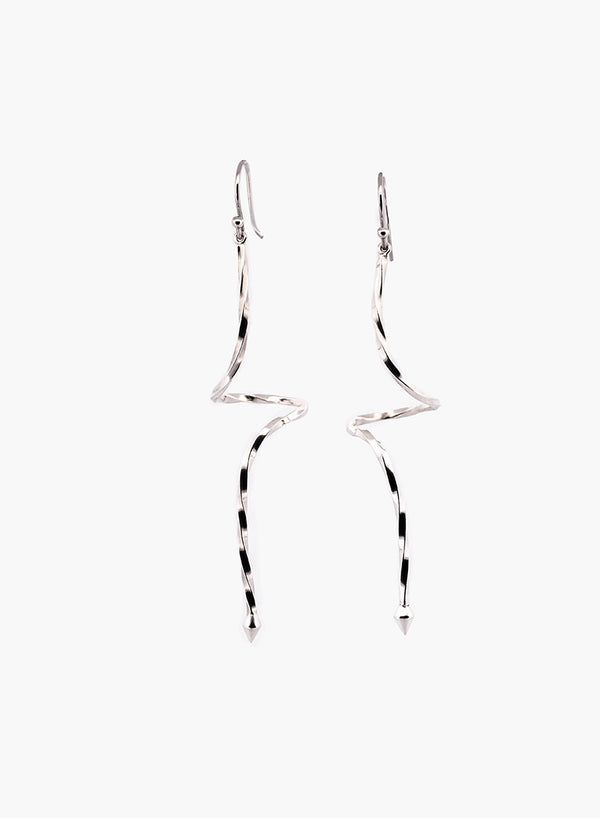 Pair of silver spiraling drop earrings on a white background