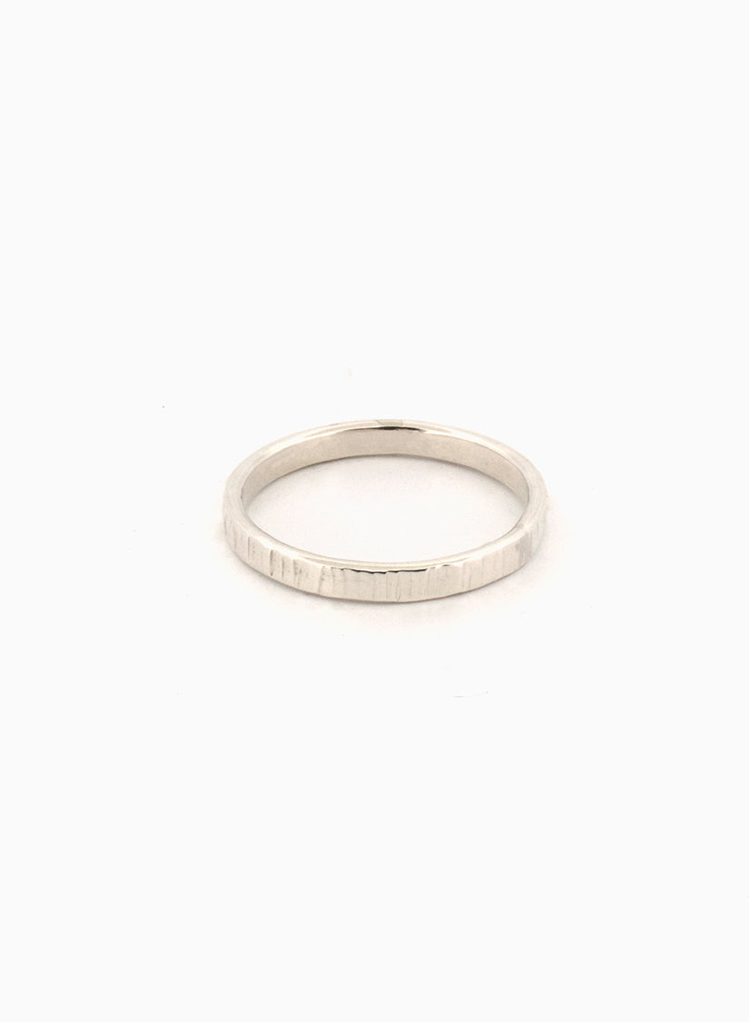 Handcrafted sterling silver hammer-textured band ring, light-reflecting fine silver ring made in Sydney Australia