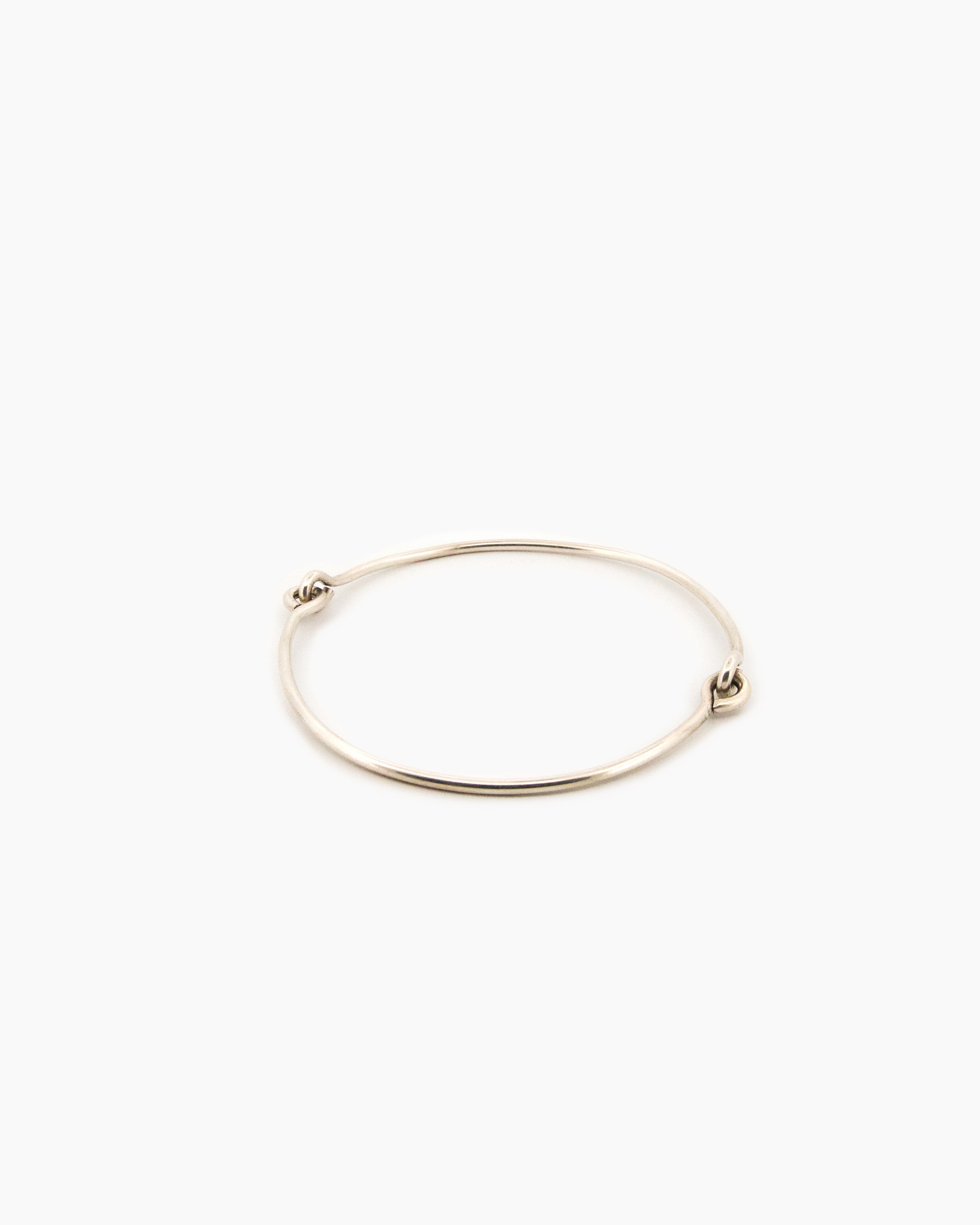 Handcrafted sterling silver hinged bangle with articulating mechanism, fine silver bracelet made in Sydney Australia