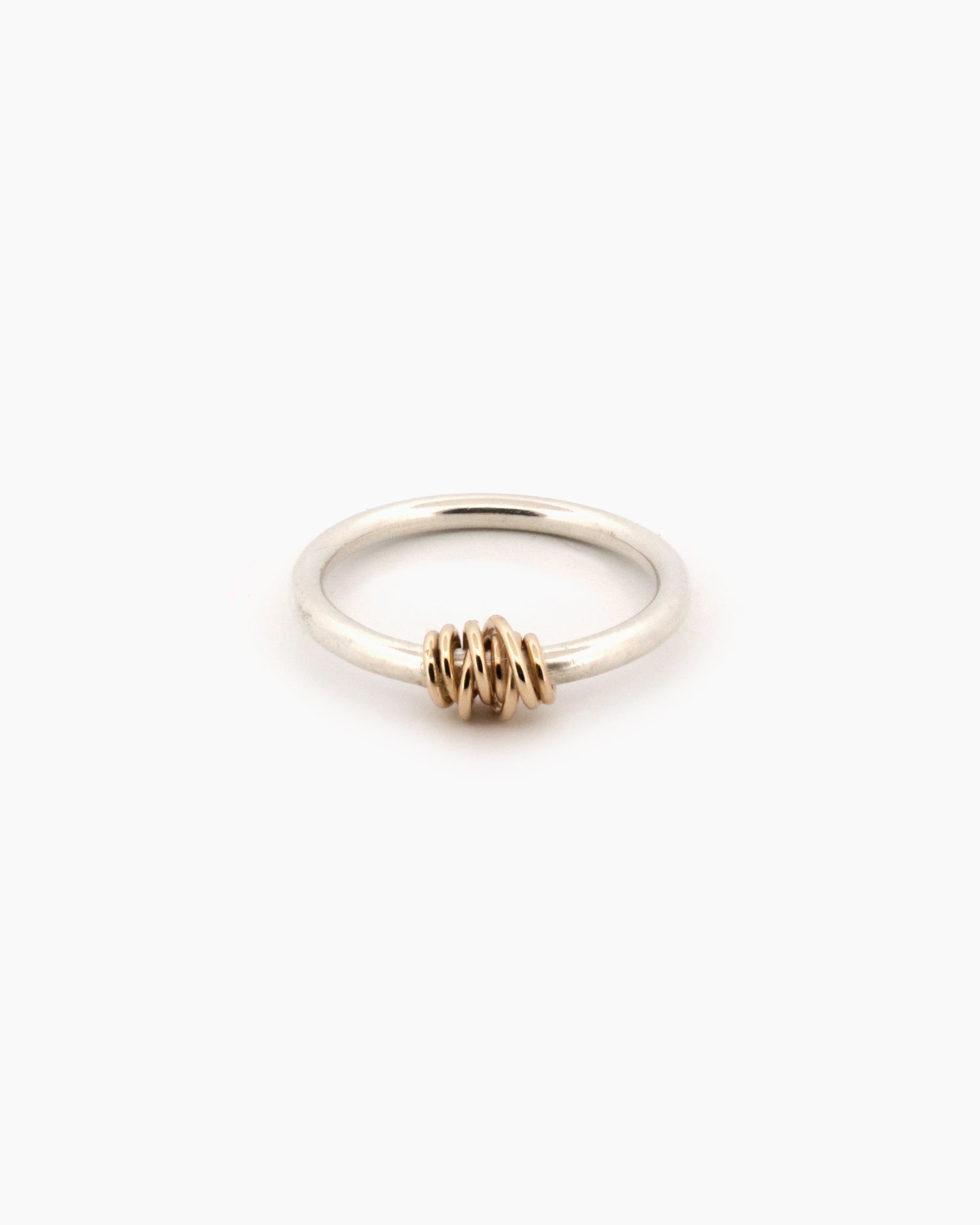Handcrafted sterling silver wrap ring with 9kt gold wire detail, two-tone fine ring made in Sydney Australia