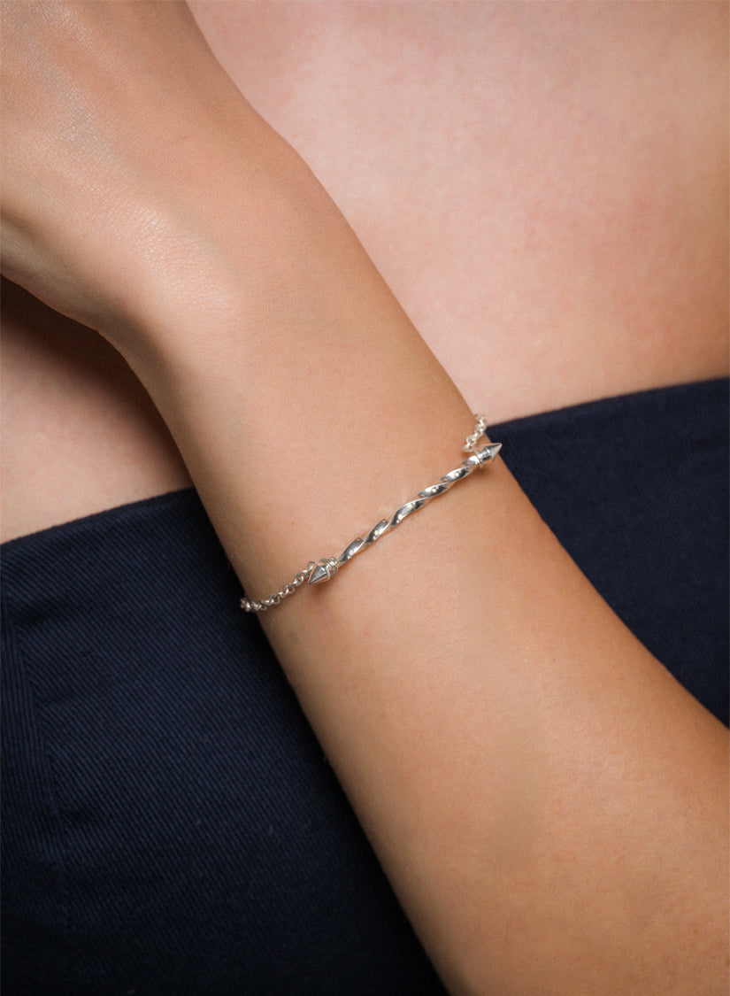 Handmade sterling Silver twist bracelet on a person's wrist